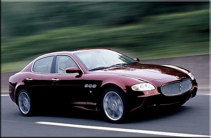 Giugno 2003 una delle prime immagini ufficiali della Maserati quattroporte la cui prima presentazione dedicata ai fornitori avvenne a Modena. Lo stile degli esterni e degli interni è di Pininfarina e l'ingegneria, le matematiche i master sono stati realizzati dalla Stola s.p.a.